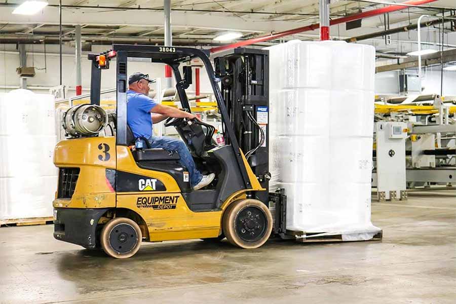 WPT Fiber and Finished goods being moved with a forklift