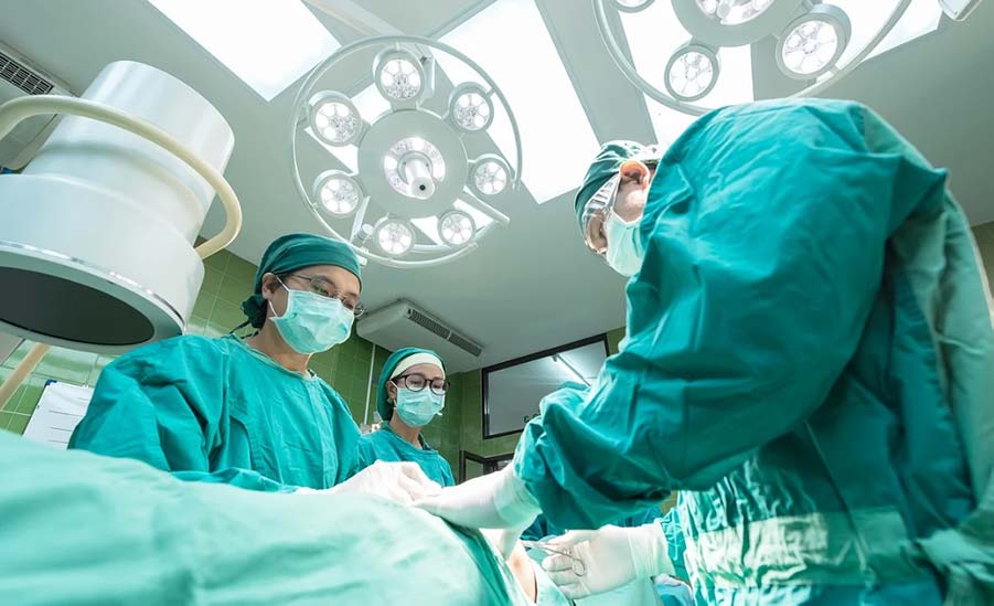 Surgeons working in an operating room