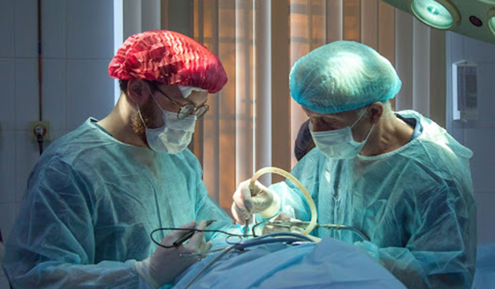 Medical workers performing surgery